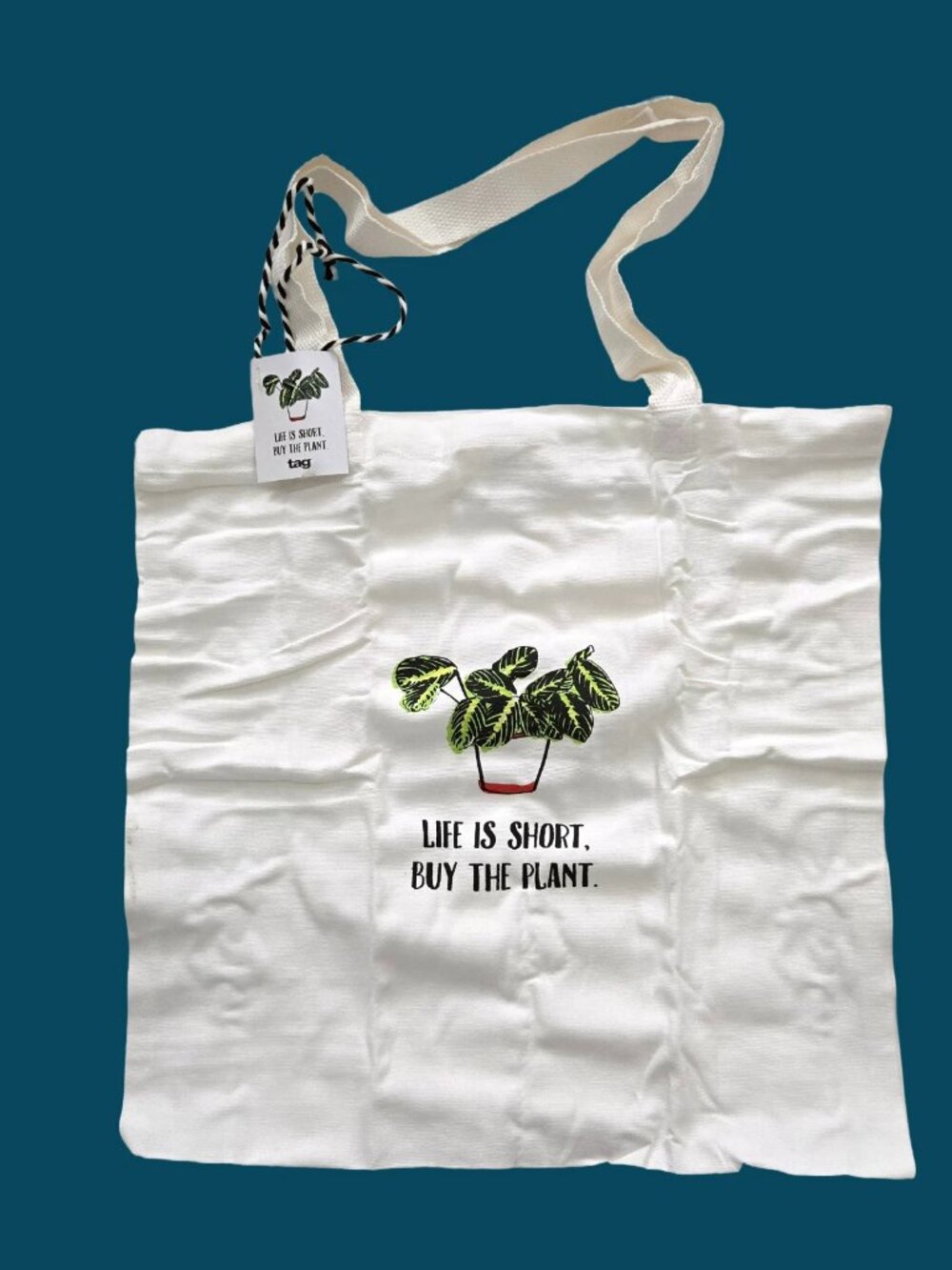 Lif is Short, Buy The Plant Tote Bag